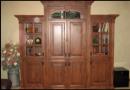 Semi antiqued glass, dentil molding and pocket doors in closed postion.