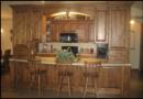 Knotty Alder Kitchen cabinets with suspended island uppers