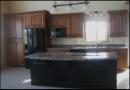 Medium alder stain color with a distressed black island.
